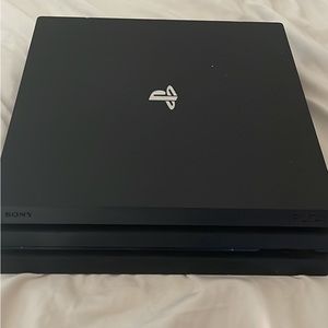 Playstation 4 Pro w/ two games